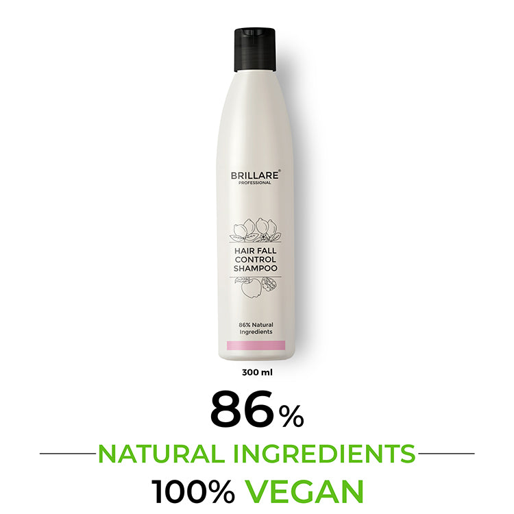 A bottle of Brillare Professional Hair Fall Control Shampoo displayed against a white background. The shampoo is described as having 86% natural ingredients and 100% vegan.