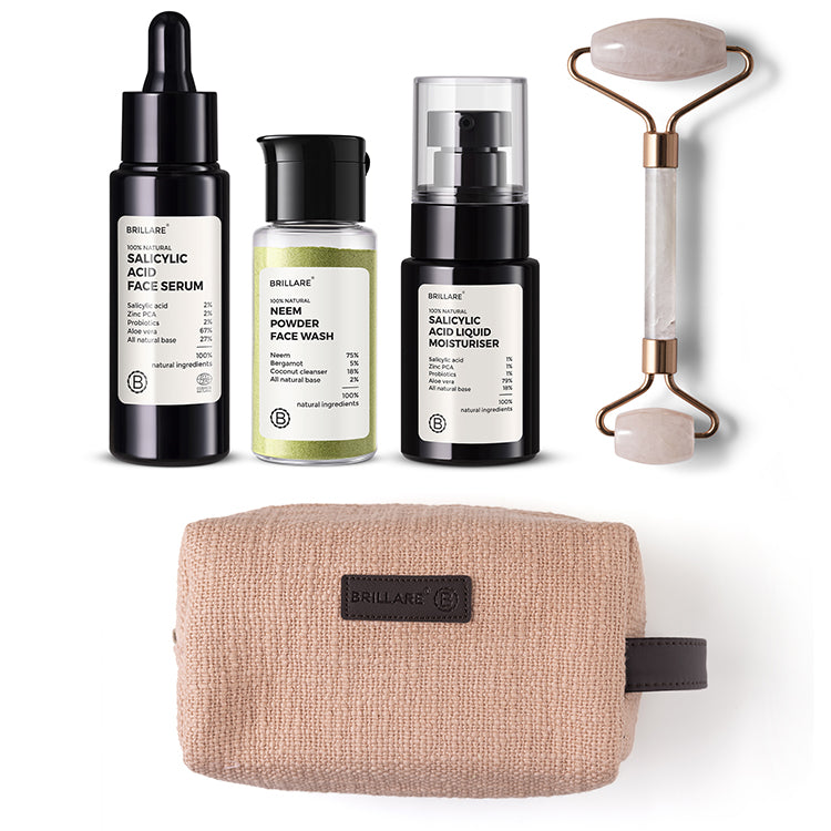 front view of Brillare Salicylic Acid Face Serum, Brillare Neem Powder Face Wash, Brillare Salicylic Acid Liquid Moisturiser, Jade Roller &amp; Pink Pouch. Ingredients mentioned on the product label.